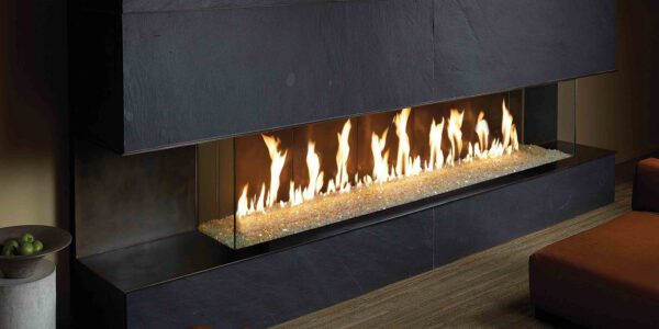 Dark Tone DaVinci Gas Linear Fireplace with flame visible on three sides by Dreifuss Fireplaces