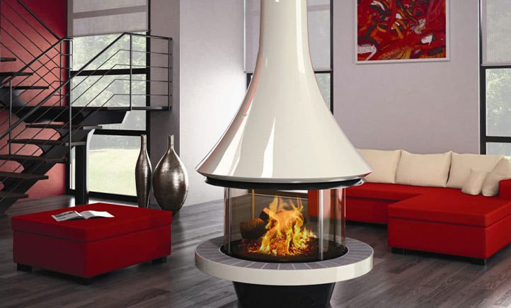 Commercial Fireplace in white and red room. The fireplace is round and in the center of the room.