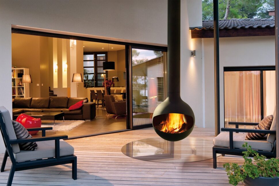 A fireplace suspended in air with exposed gas venting