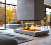 Modern living space with a see-through fireplace, seamlessly connecting two rooms.